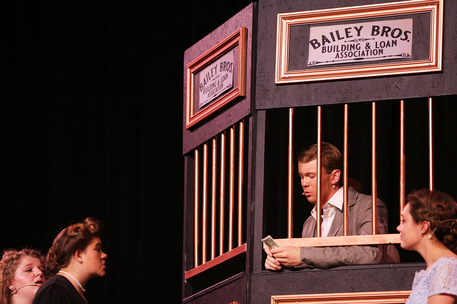 George Bailey hands out a personal loan in cash